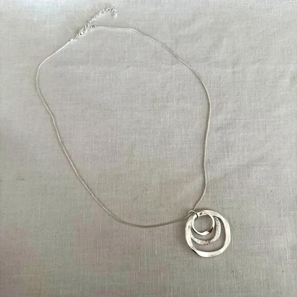 Silvertone Necklace 22-24 inches with Pendant Trio of Irregular Textured Rings - Picture 4 of 7